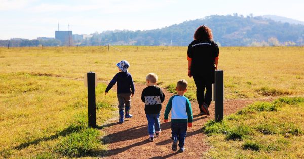 There are 10 years between Theresa's two sons, but her job meant that didn't matter