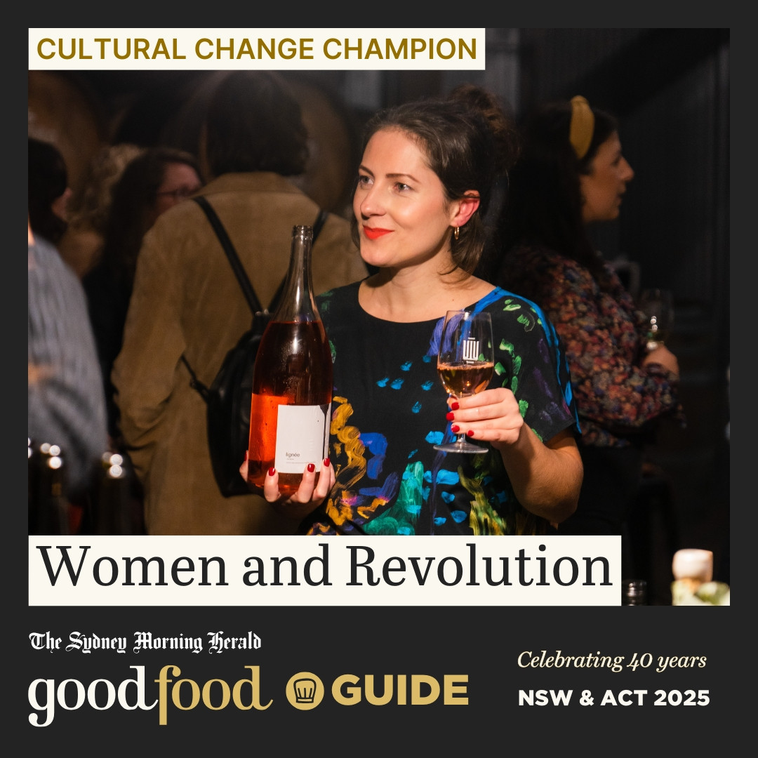 A woman holds a bottle and glass of wine. Text overlay reads Cultural Change Champion, Women and Revolution. with Sydney Morning Herald Good Food branding.