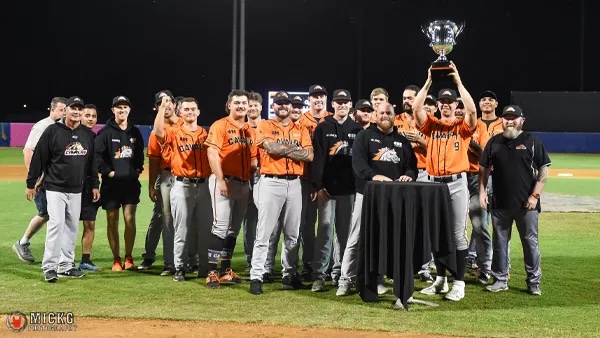 The Canberra Cavalry holding up a trophy 