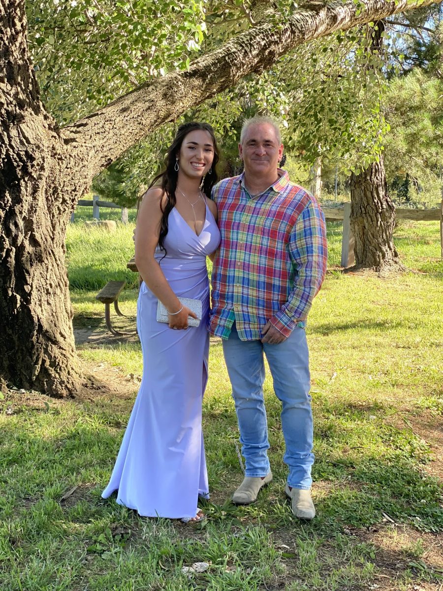 Peyton in formal dress with Dad