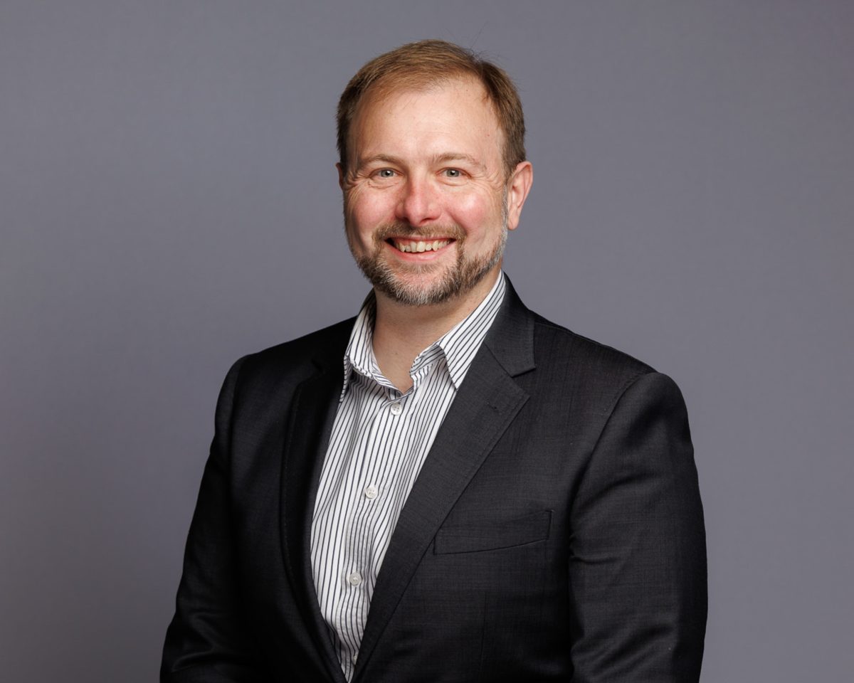 man in suit smiling