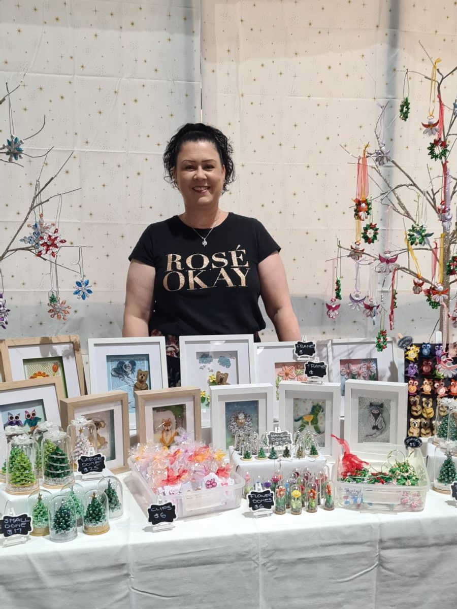 Woman in front of art display