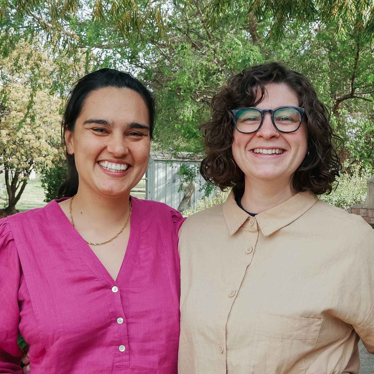 Two women standing together