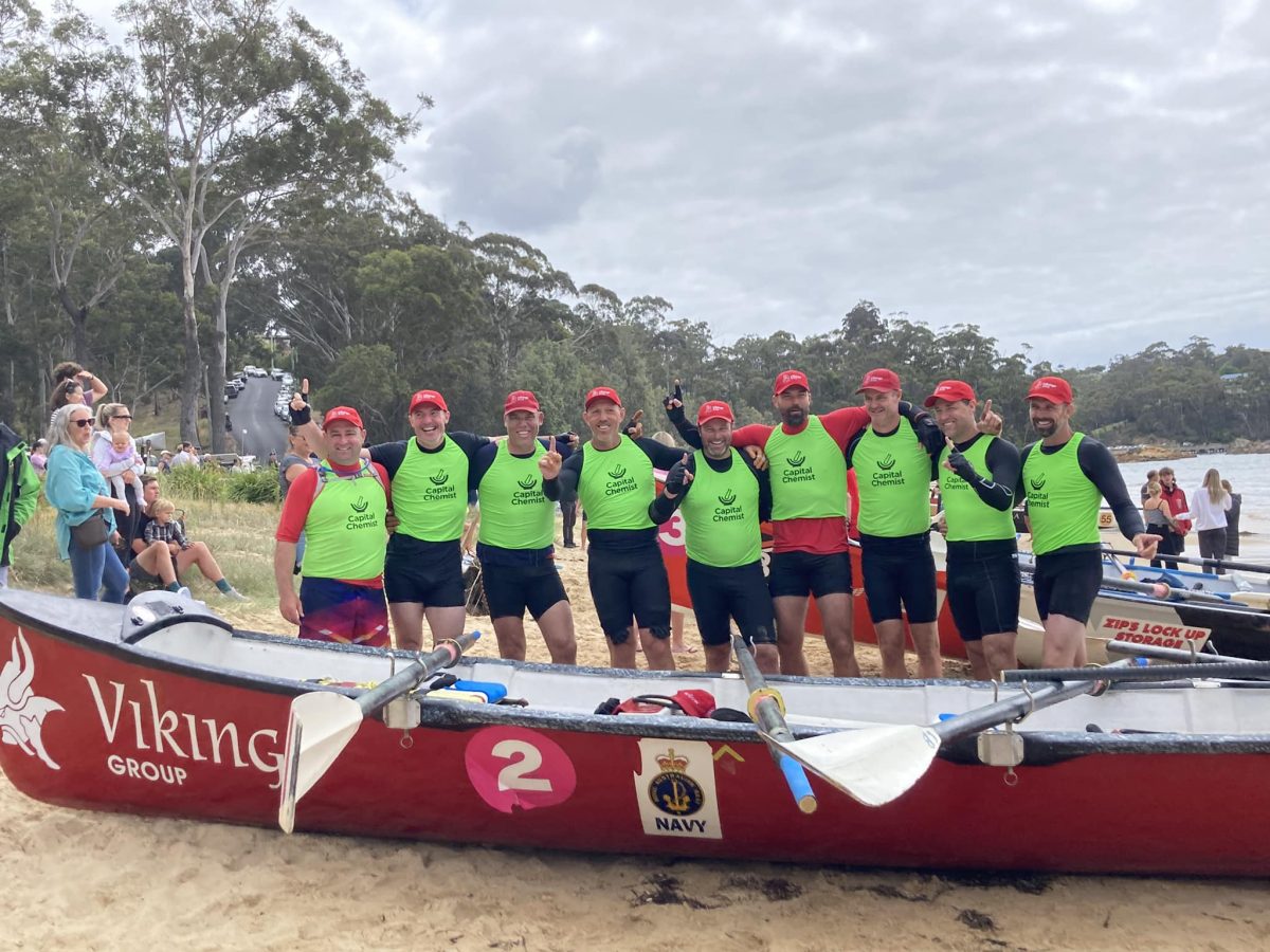 Members of the Moruya-Canberra Vikings smile for the camera at the end of the George Bass Marathon in 2023. 