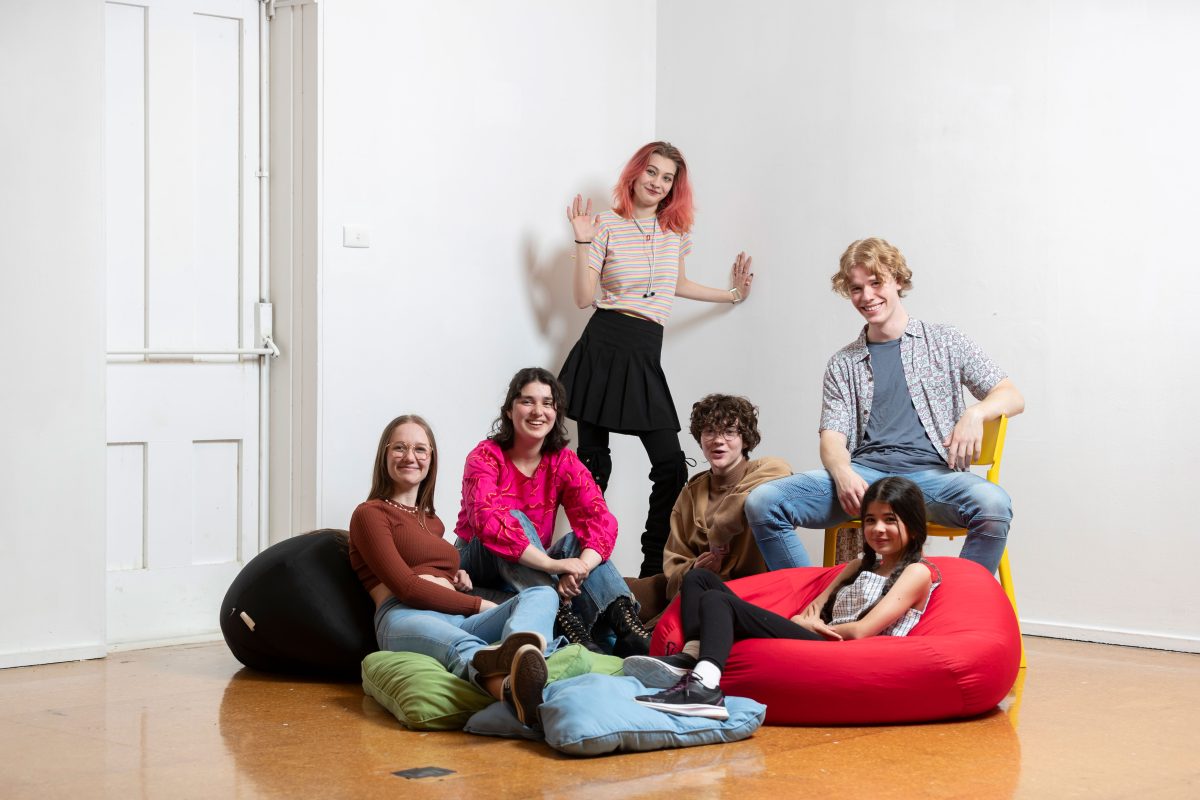 young people sitting on bean bags