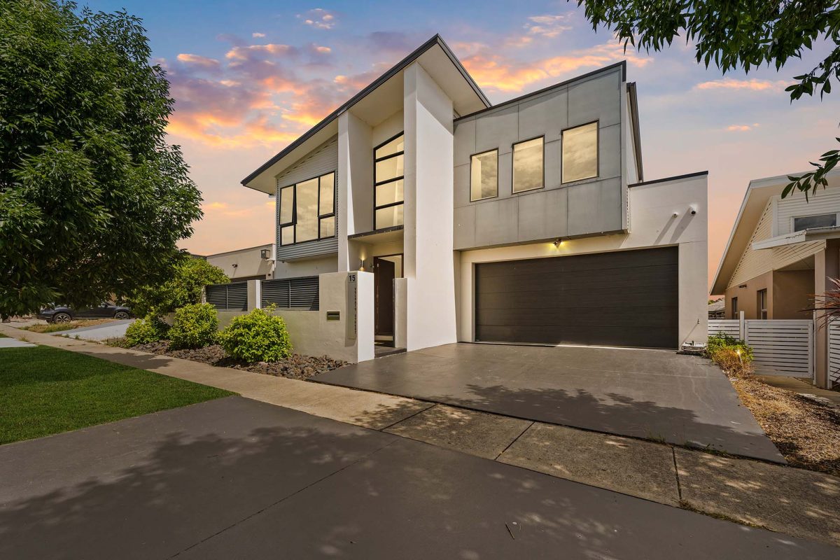 The street view of 15 Volpato Street in Forde, with front windows and garage in view