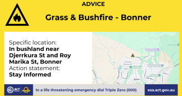 Firefighters tackling bushfire at Bonner