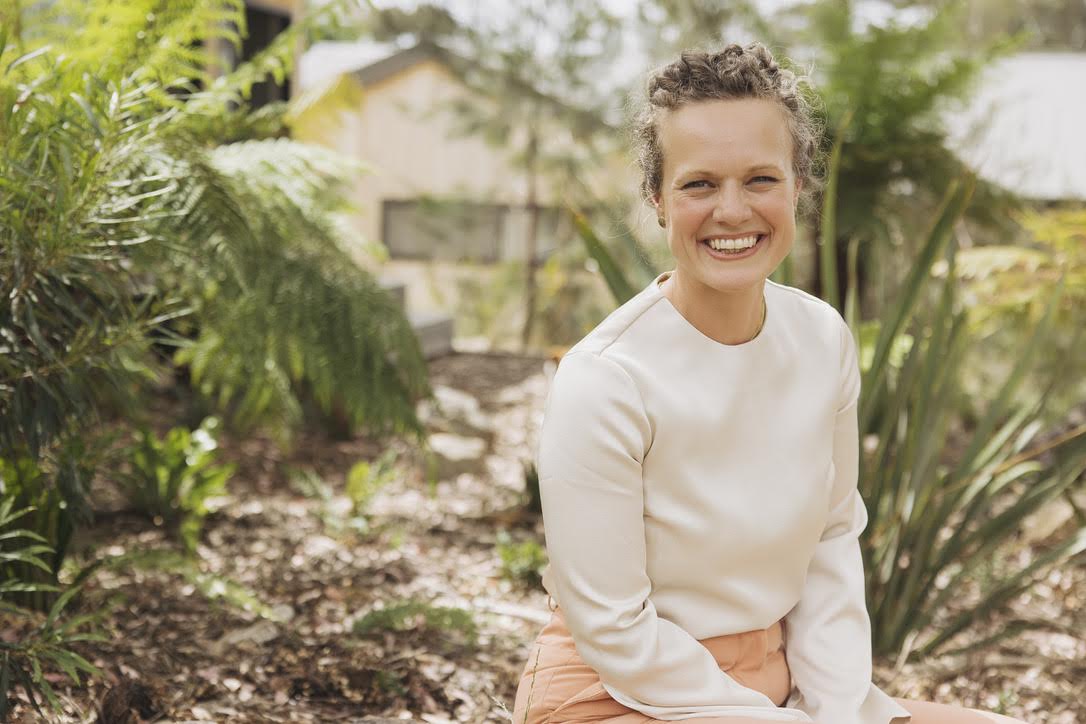 Woman sitting in garden