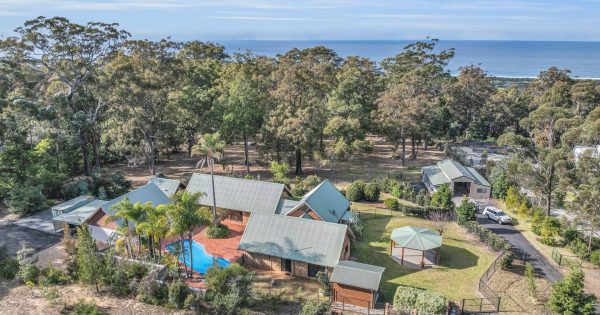 Escape to the ocean with this resort-style jewel on Tura Beach acreage