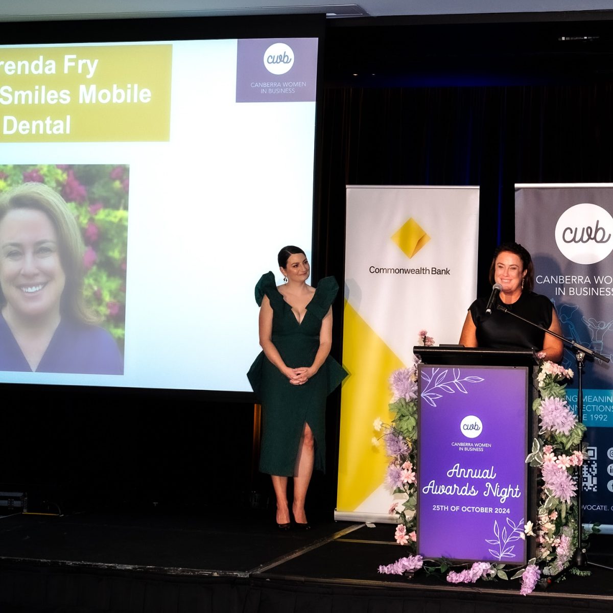 Brenda Fry on stage receiving award