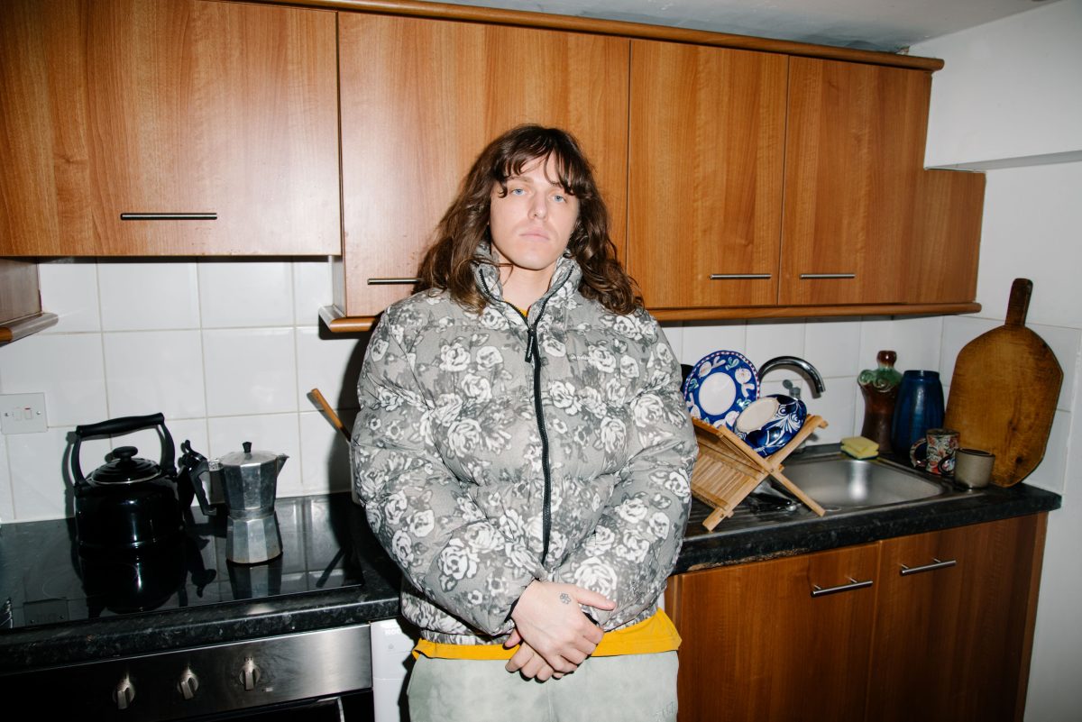 man standing in a kitchen