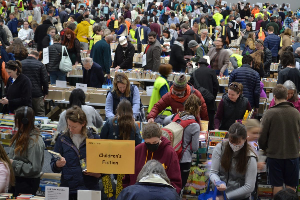 Patrons scour thousands of books at a charity's sale