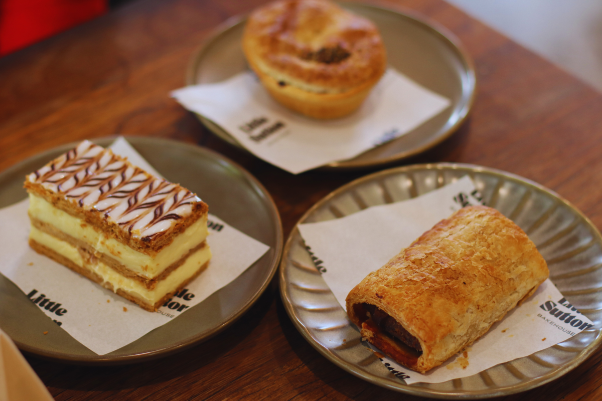 A sausage roll, a pie and a vanilla slice