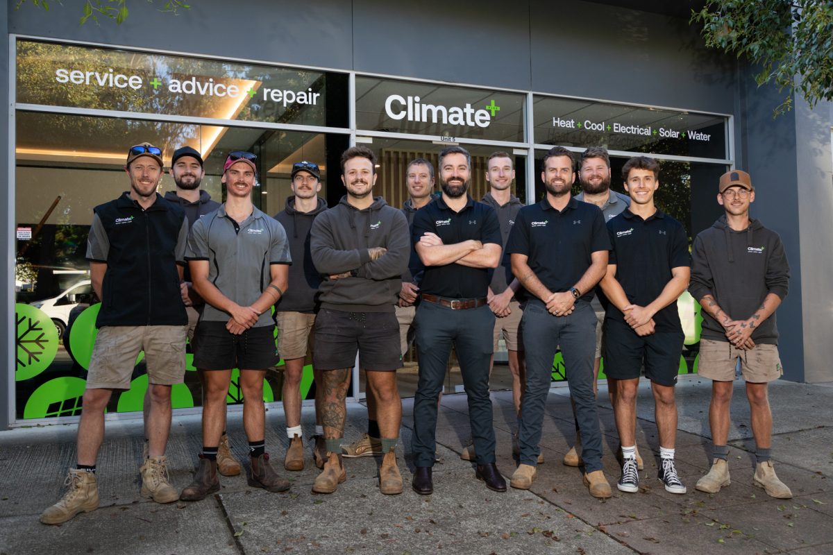 Group of tradies looking at camera