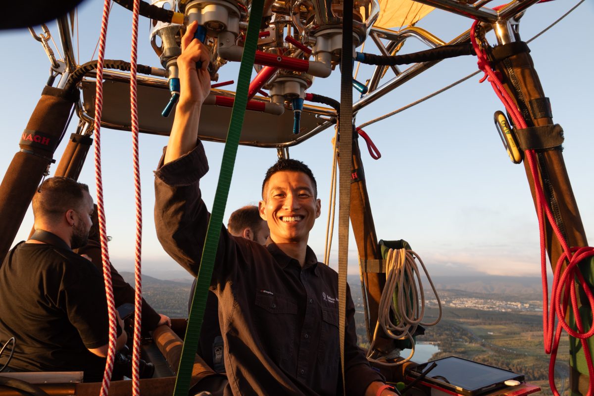 man piloting a hot air balloon