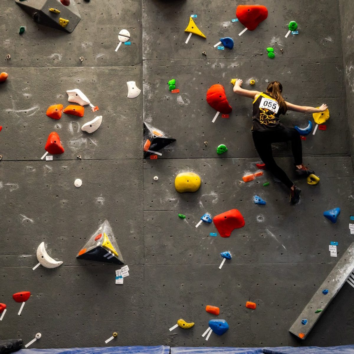 woman rock climbing