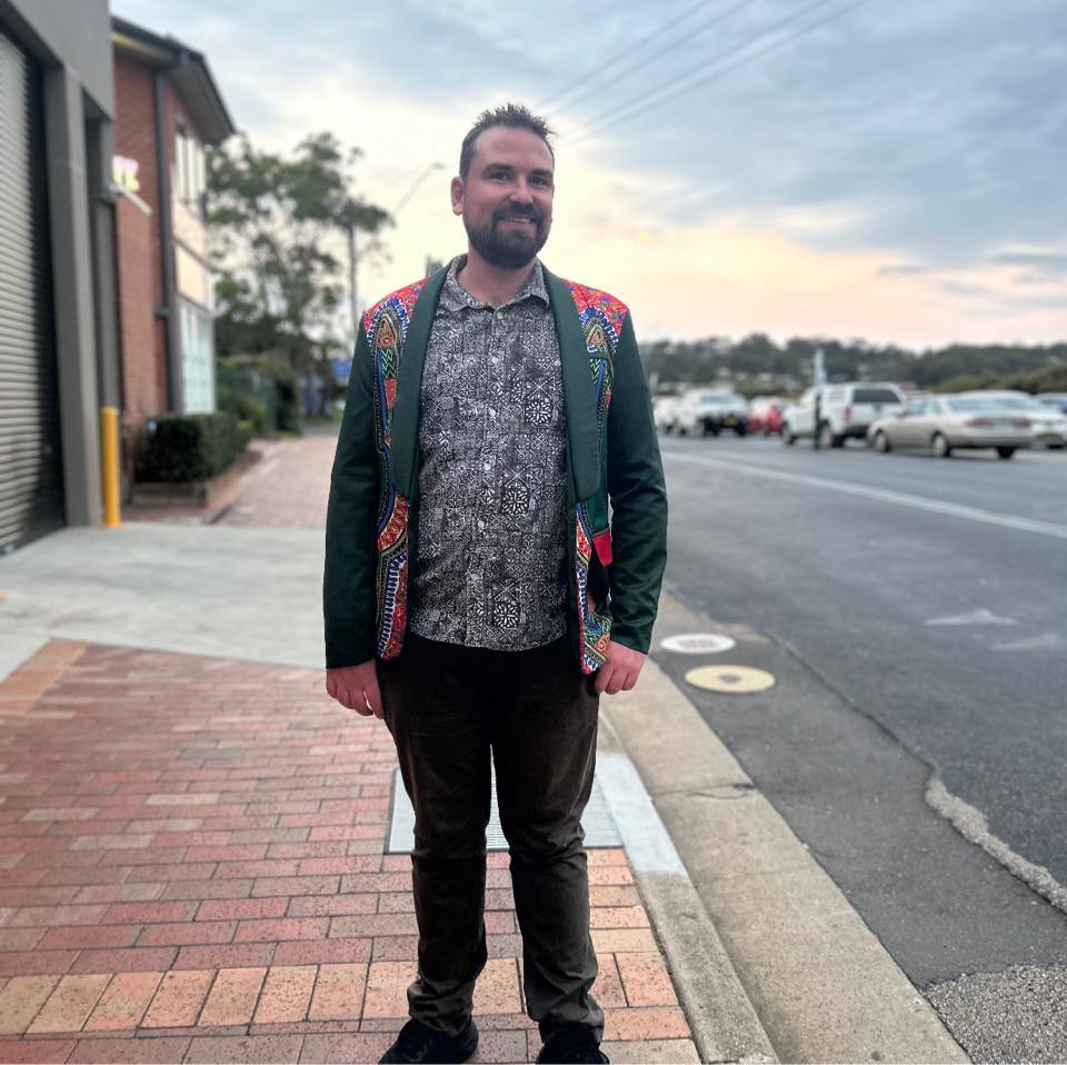 A man standing on a street