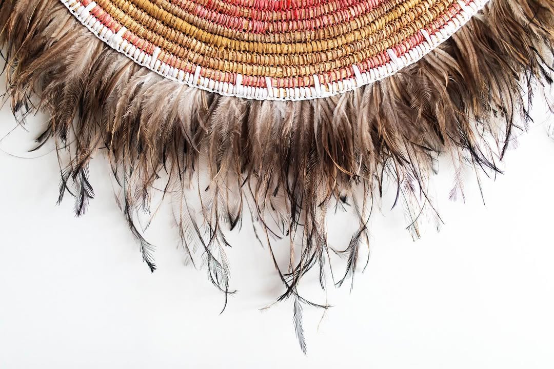 Emu feathers in a woven wall-hanging