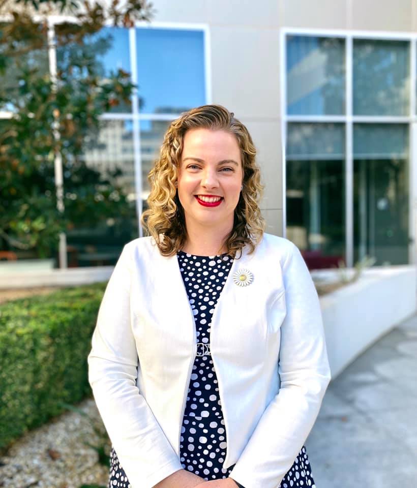 woman in white jacket