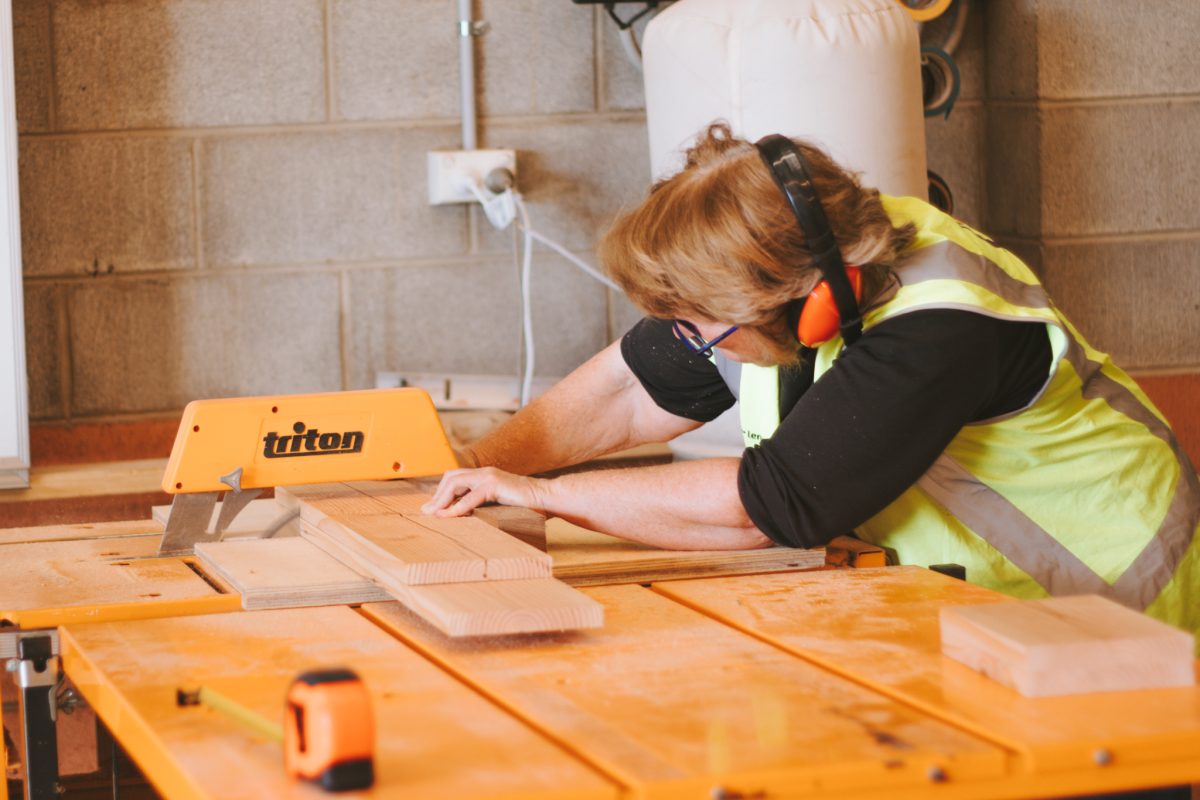 woman at carpentry workbench