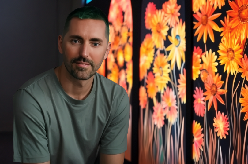 A headshot of Matt Aberline with his art creation.