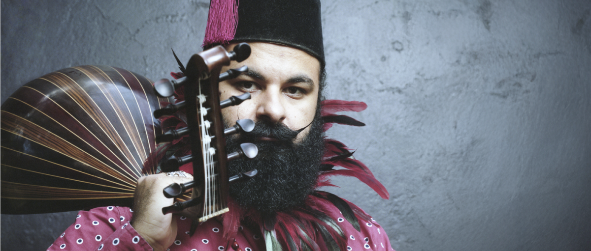 Joseph Tawadros with an oud instrument