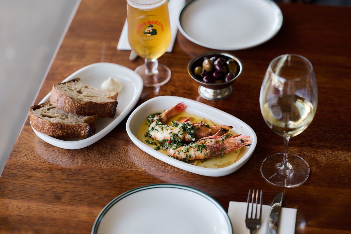 Dishes of Mediterranean food on a table.