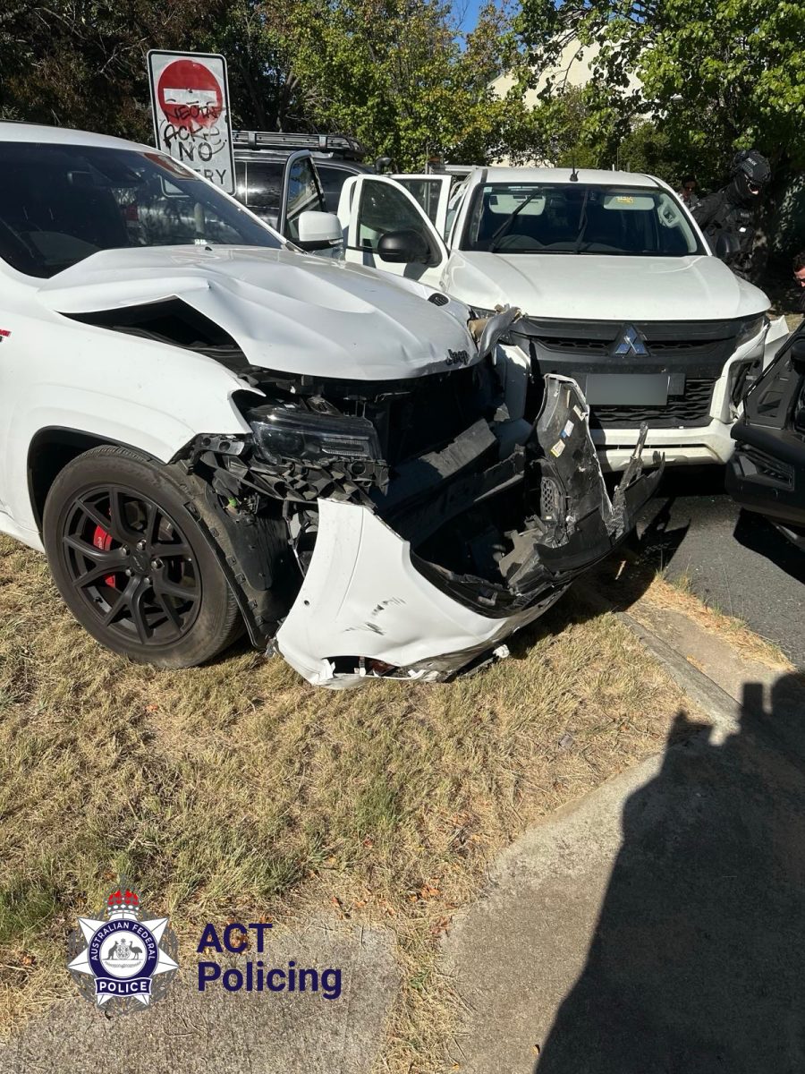 A police car allegedly rammed by a stolen vehicle 