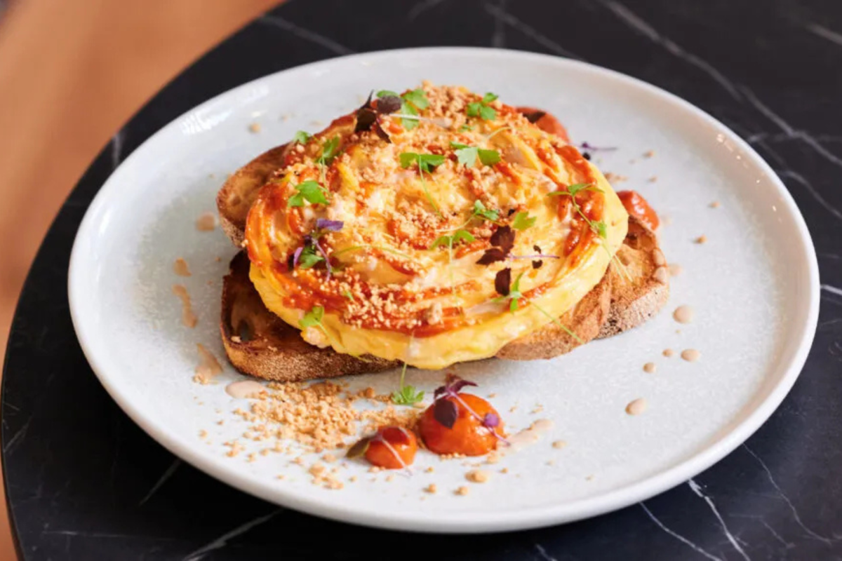 A swirl of scrambled eggs on toast.