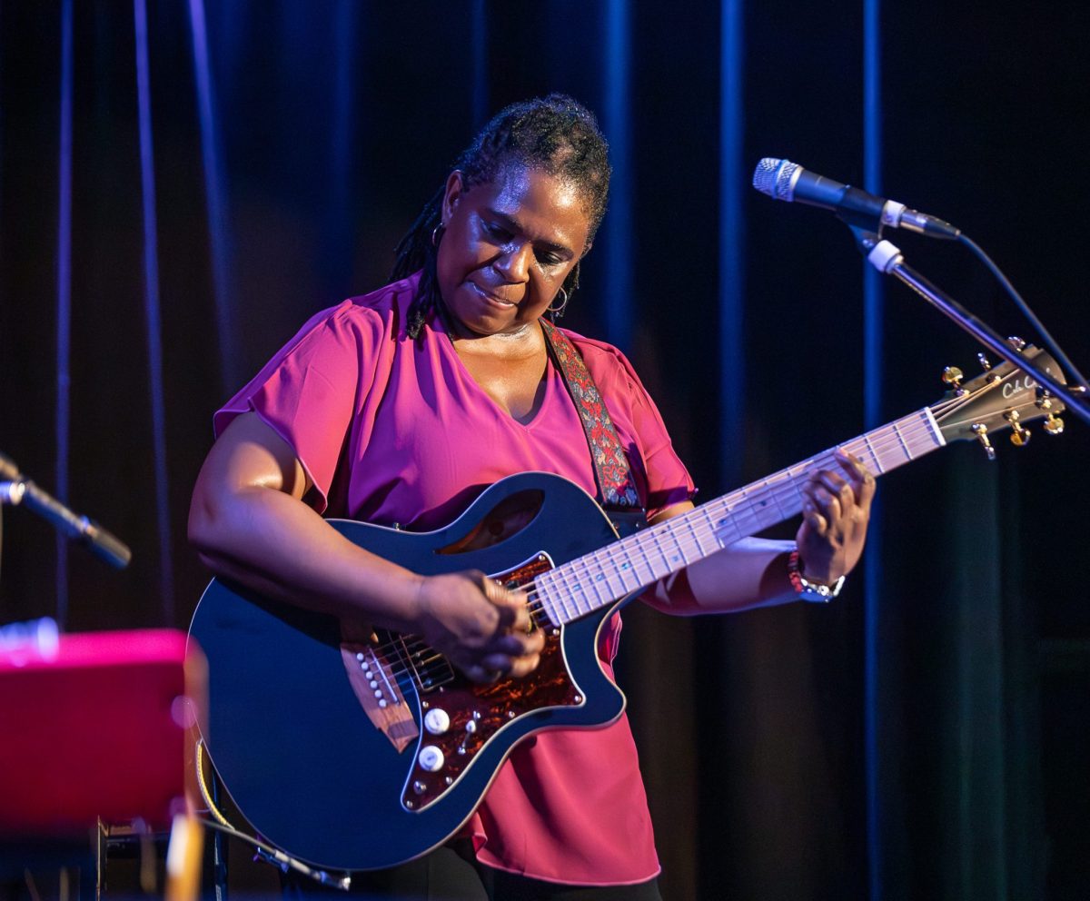 woman playing guitar