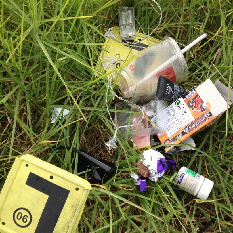 Strange deposits of rubbish along the road - this one looks like someone opened the car door and dumped the contents out in one lot. Photo: Elka Wood. 