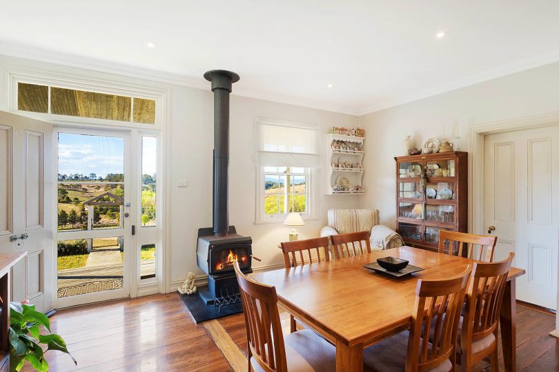 The slow-combustion stove is pictured but the house also has gas heating throughout. Photo: Supplied. 