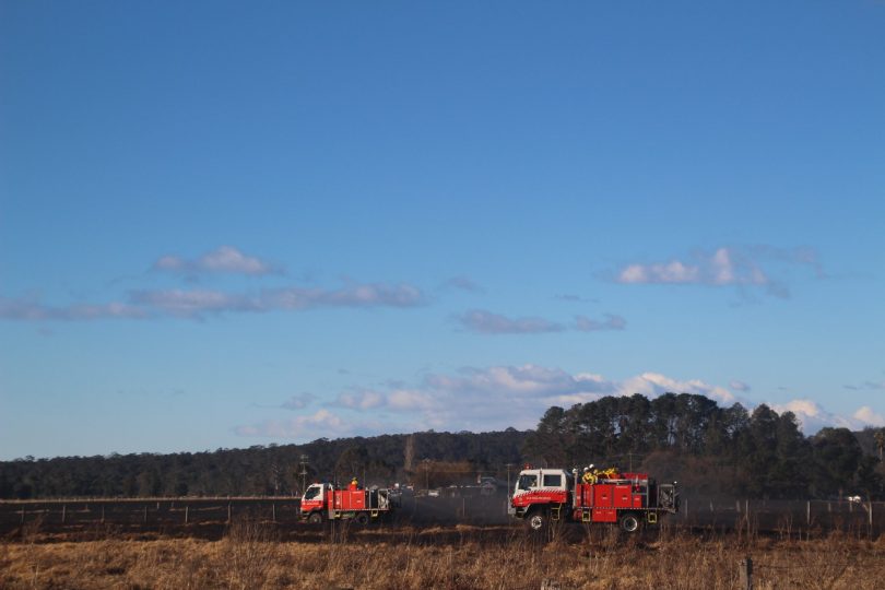 Firefigters won out in testing conditions in the Moruya river flats on Saturday afternoon. Photo: Alex Rea.