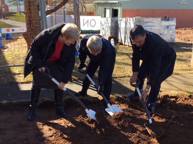 Professor Michelle Lincoln, Professor Imogen Mitchell and Professor Deep Saini turn the first sod on the joint ANU - UC facility in Cooma. Photo: Supplied.