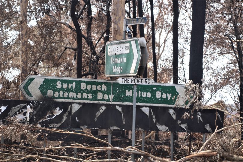 Fire-damaged sign in Batemans Bay