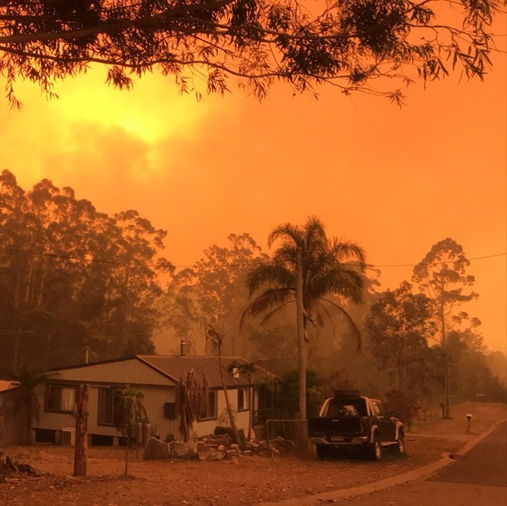 House in Mogo through thick smoke.