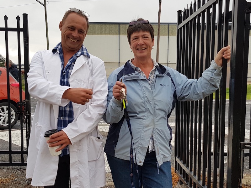 Goulburn Show Society president Jacki Waugh and rabbit steward Sebastion James opening show gates.