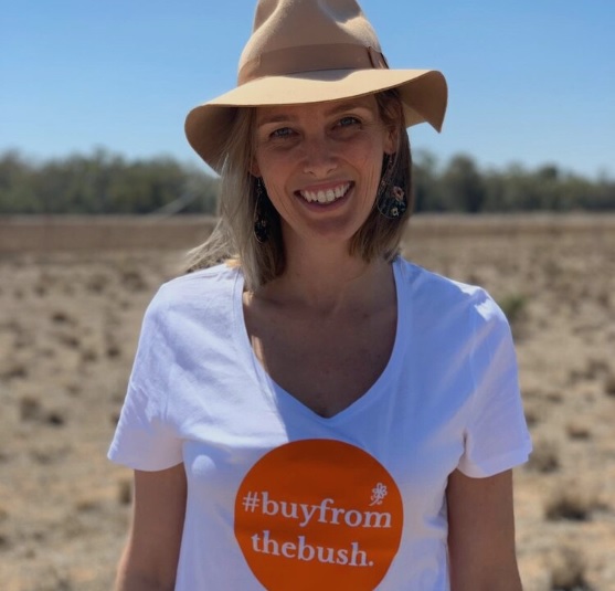 Grace Brennan on farm wearing #buyfromthebush T-shirt.