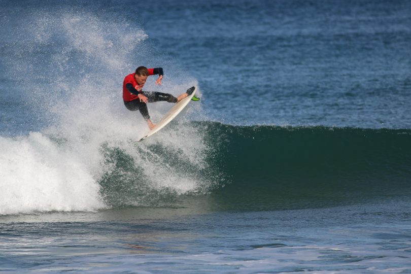 Dave Perry surfing at Malua Bay.
