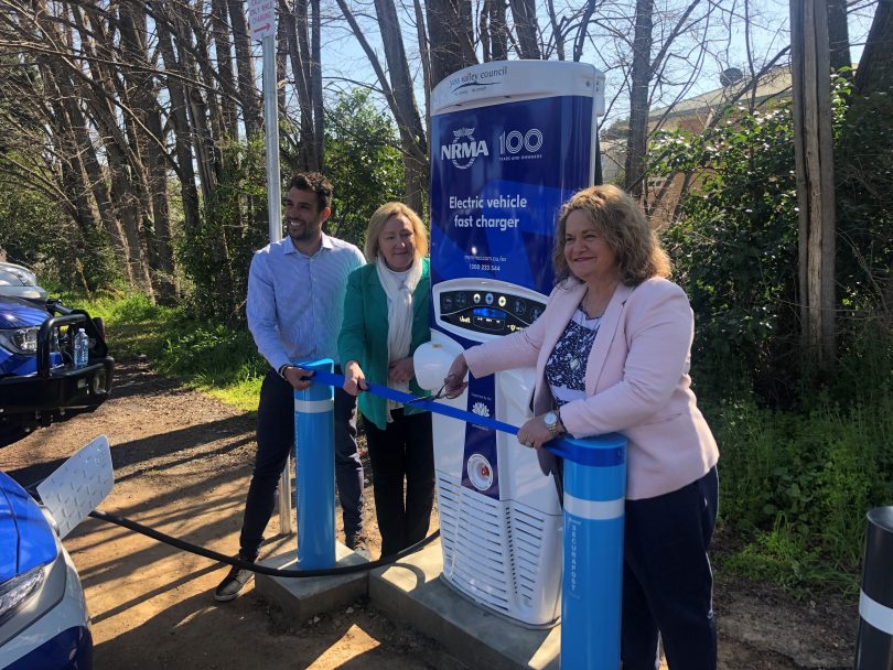From left: Dan Maranhao, Rowena Abbey and Wendy Tuckerman unveiling new electric vehicle fast charger in Yass.
