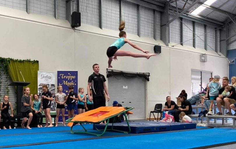 Gymnast doing routine at Invert Gymnastics.