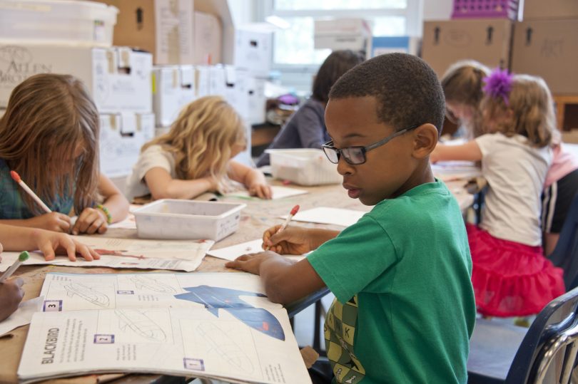 School students in classroom.