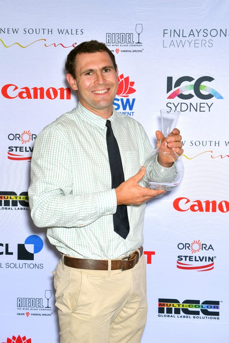 Tom Mullany holding trophy.