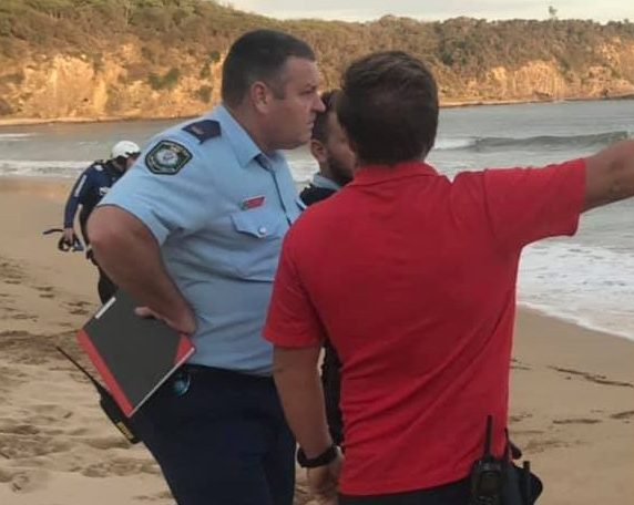 Chief Inspector John Sheehan on beach during search for missing snorkeller.