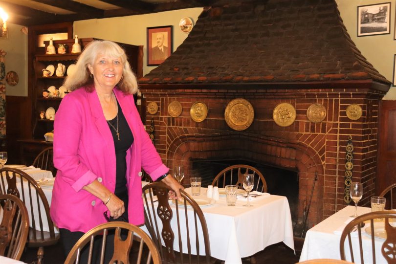 Carol James inside The Fireside Inn.