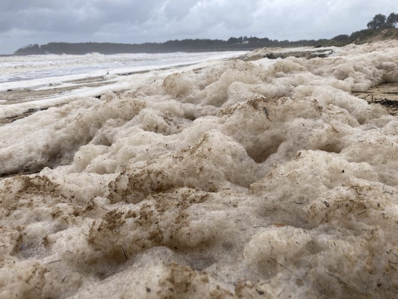 Sea foam on South Coast beach.