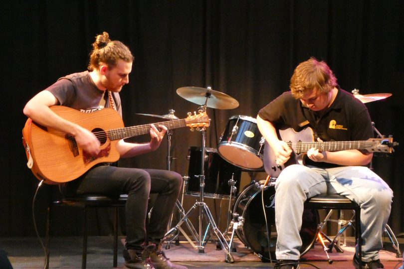 Hume Conservatorium students playing music onstage