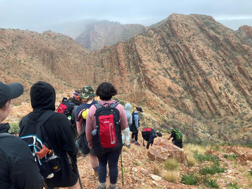 Youths trekking on Larapinta Trail in Northern Territory