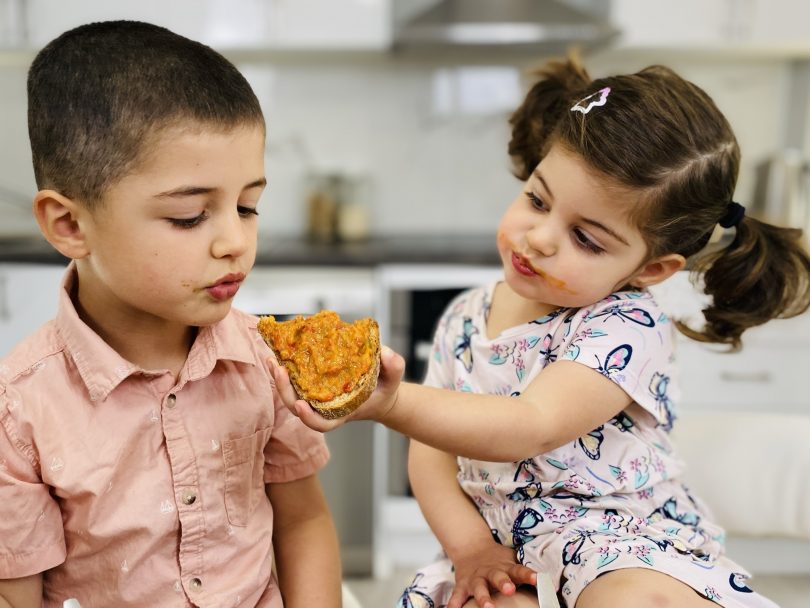 Raoul and Sarah Piloiu eating zacusca