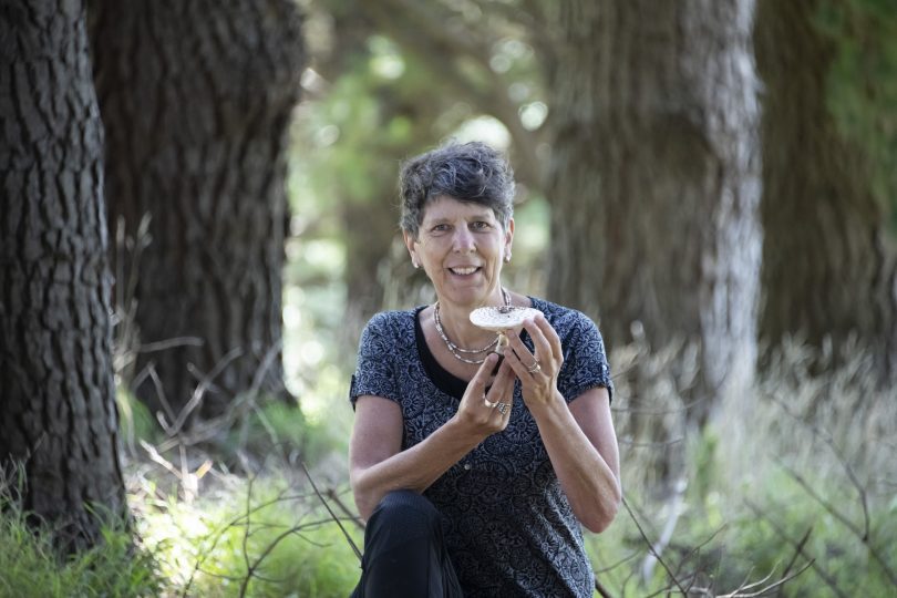 Woman holding mushroom